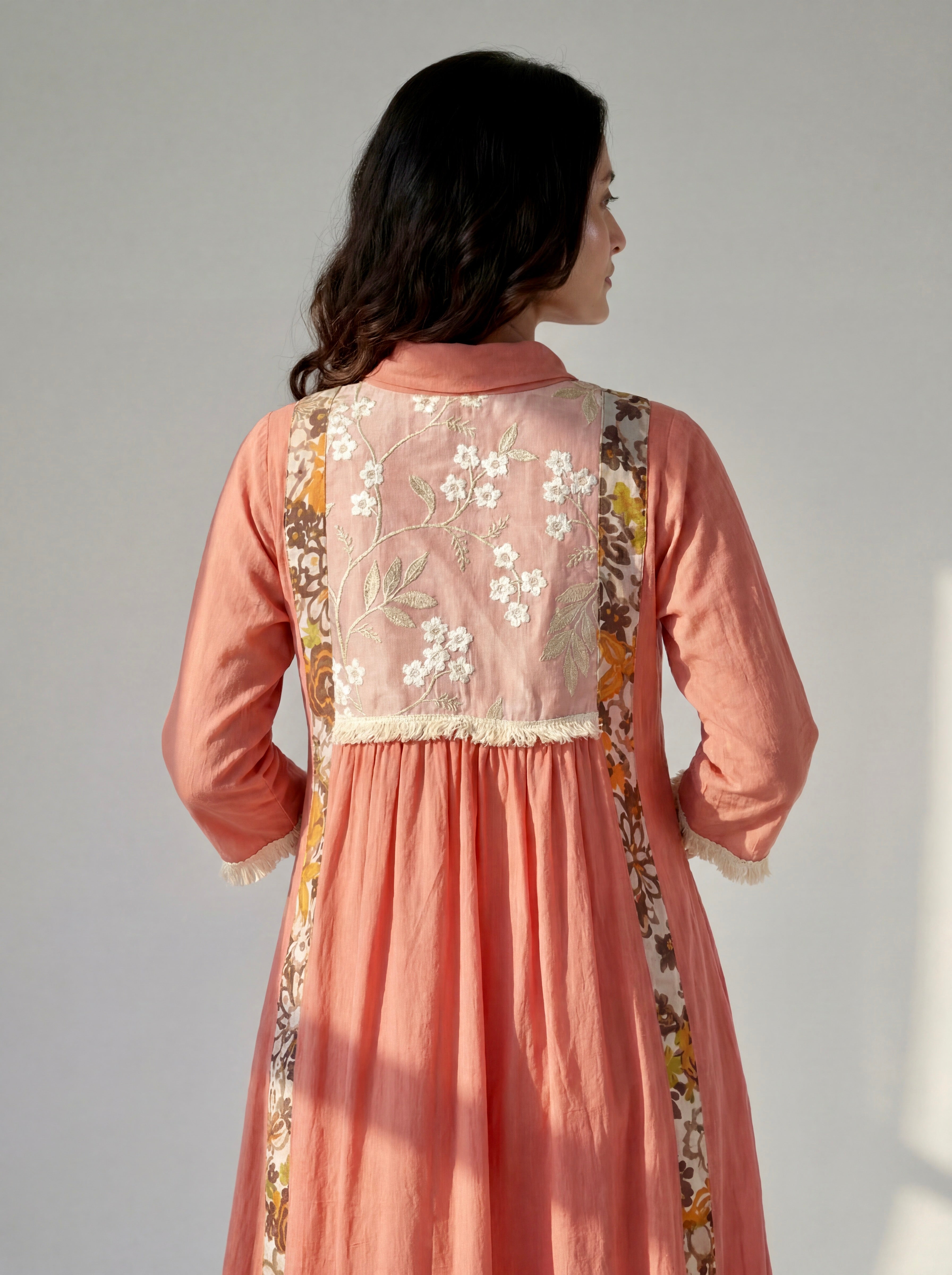 Blush Pink Cotton Dress with Floral Embroidered Yoke, Printed Panels and Fringe Details