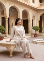 Pure linen beige co-ord set with frayed edges and wooden buckle accents.